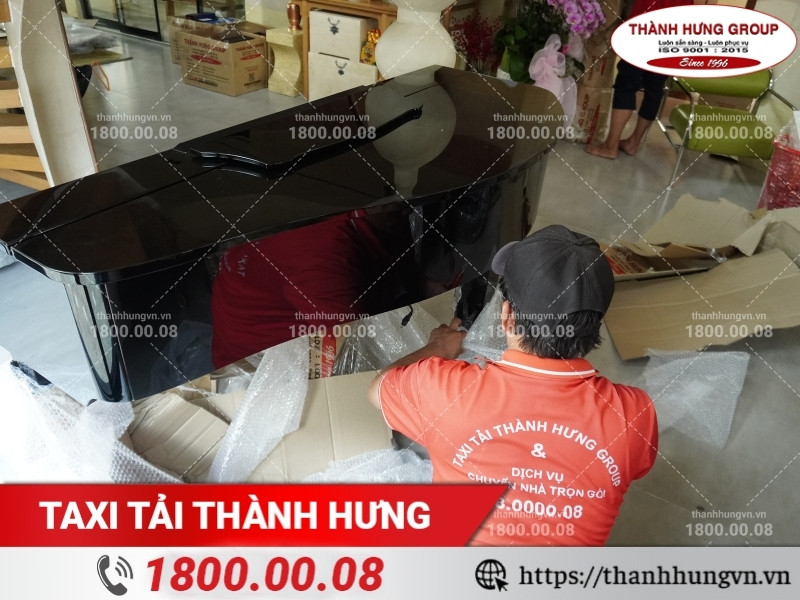 Tháo lắp đóng gói đàn tại nhà mới